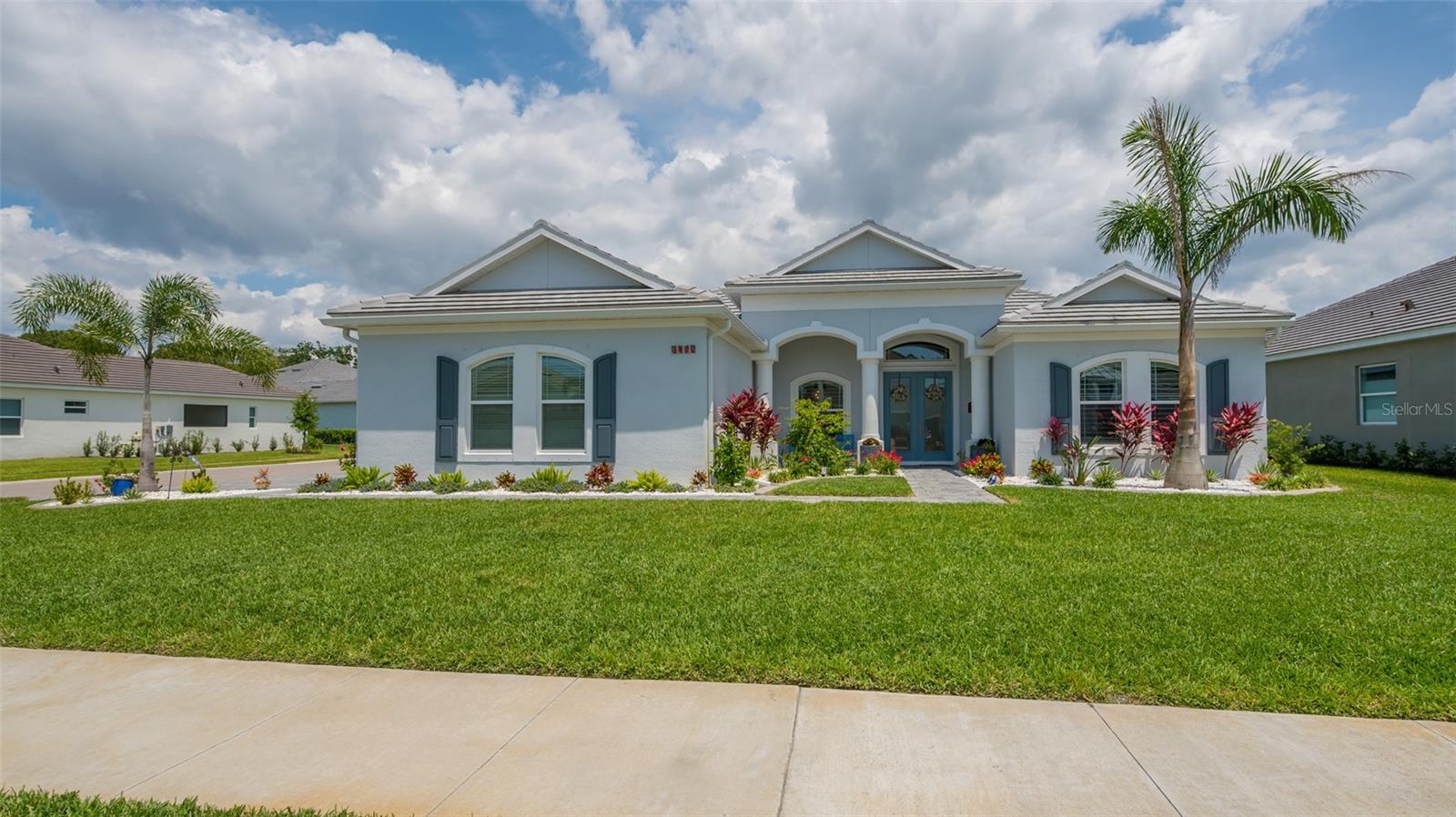 Located in Waverley subdivision, a cozy, boutique gated community, this newer build, corner lot home is ready to welcome its new owners. Only minutes from I-75, this gorgeous home is complete with three bedrooms, two full baths and an office/fourth bedroom, leaving no shortage of space for guests. The spacious master offers an elegant tray ceiling, direct access to the lanai, ample closet space and an en-suite with walk-in shower, large soaking tub and double vanities. The open concept, gourmet kitchen is complete with quartz countertops, huge breakfast bar, walk in pantry, soft close cabinets and top of the line stainless steel Samsung appliances. Other features include wood-like plank tile throughout, three car side load garage with built in shelving and epoxy flooring, a heated pool with color changing, underwater led lights and screened in lanai. Separate laundry room has a utility sink and built in cabinets. Beautiful landscaping, partial pond view, double front doors with frosted glass to let light in. Only a short drive from world famous Siesta Key beach, Lido beach, golf courses, St. Armand’s Circle and downtown Sarasota. Sarasota Schools, Riverview HS. No CDD, low HOA.