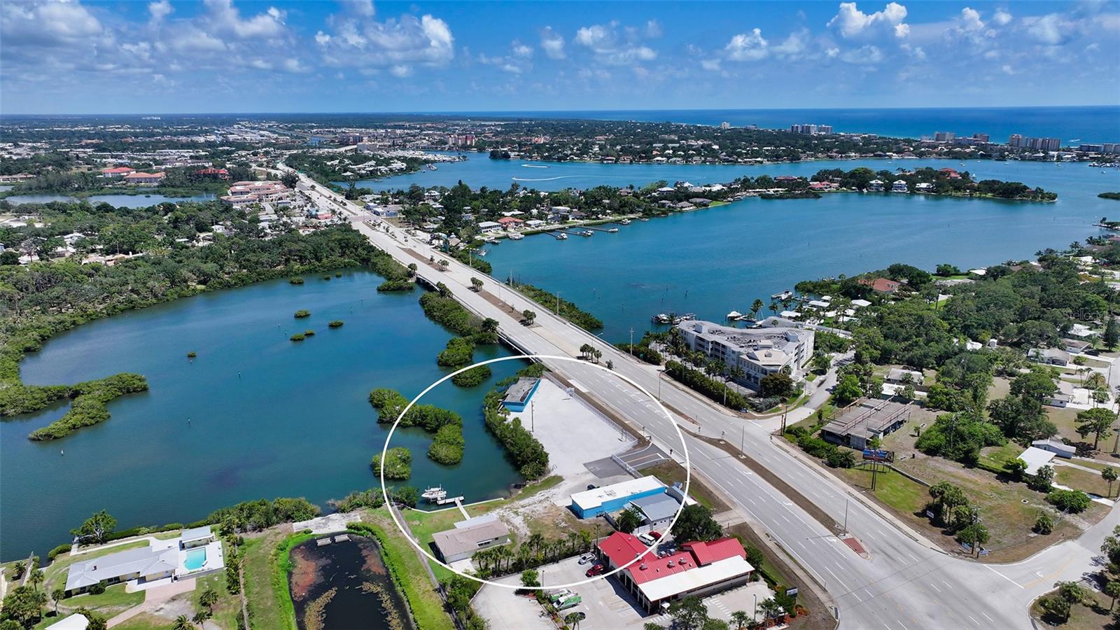 Located in the heart of Nokomis, Florida, 499-501-505 South Tamiami Trail offers an exceptional commercial property that combines a prime location with ample space, making it a perfect investment for a variety of businesses. This property is ideally positioned on a bustling thoroughfare, ensuring maximum visibility and easy access for clients and customers.
The property spans on an impressive area of 1.5 acres on 3 separate lots, providing 2 buildings, one with over 2,600 square feet and office space and the second building with over 3,000 square feet of versatile space suitable for various commercial uses. Zoned CG per county Zoning code. Whether you are looking to establish a retail store, office space, restaurant, marina or a combination of uses, this property offers the flexibility to meet your business needs. The layout is designed to accommodate high traffic, the 500 feet of waterfront with over 150 feet of dockage and one lift make it a very unique and ideal commercial investment.
One of the standout features of 499-501-505 South Tamiami Trail is its strategic location. The property can be accessed by water or road. Positioned on a major artery of Nokomis, it benefits from high daily traffic counts, ensuring your business will receive the exposure it needs to thrive. The surrounding area is a vibrant mix of residential neighborhoods and commercial establishments, creating a dynamic environment that attracts both locals and visitors.
The property boasts ample parking, a critical asset for any business operation. Easy access to the parking area ensures convenience for customers, enhancing their overall experience.
In summary, 499-501-505 South Tamiami Trail in Nokomis, Florida, represents a unique commercial real estate opportunity. With its prime location, waterfront property, and versatile space, it is an ideal choice for entrepreneurs and established businesses looking to expand. Don’t miss the chance to secure a prime spot in one of Florida’s thriving commercial corridors.