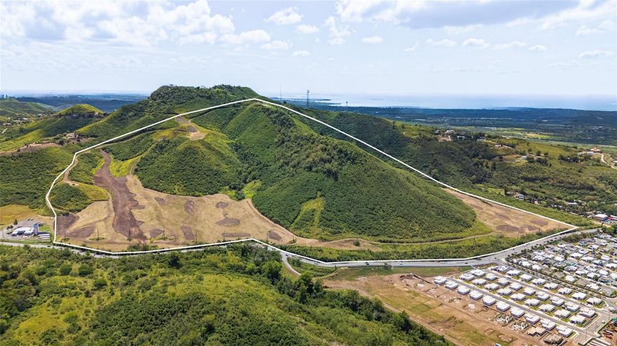 Positioned in Santa Isabel, this 141-cuerda development site brings together scale, infrastructure readiness, and a defined residential vision oriented around coastal living, supported by open Caribbean Sea views and immediate connectivity to one of Puerto Rico’s principal transportation corridors. This is a rare opportunity to acquire the equivalent of 139 acres of shovel-ready land with plans for a mixed-use residential community. 

The design contemplates a well-balanced development program including condominium-style residential buildings, single-family homes, land lots for custom residences and a designated commercial component. This framework supports a flexible development strategy with the ability to phase construction, diversify product offerings, and align delivery with market demand while maintaining overall community cohesion. 

On the ground, the site is already organized for progression into construction. Primary internal pathways have been cleared and defined, establishing an efficient circulation layout that transitions seamlessly into paving and full infrastructure build-out. The scale and topography support streamlined implementation across multiple phases without compromising design intent or planning integrity. Strategic enhancements further elevate the scope of the project, aligning the development with high-access mobility considerations for future residents and stakeholders. 

Connectivity remains highly efficient: the site is approximately 10 minutes from PR-52, ensuring direct linkage to the island’s principal highway network, and about one hour from San Juan, maintaining a practical connection to the metropolitan core while preserving a distinct coastal setting. 

This is a fully structured residential development platform designed for execution efficiency, program flexibility, and long-term value creation at scale.
