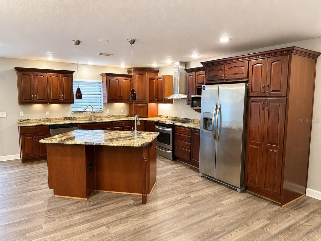 Photo of 664 Channing Drive, Palm Harbor, FL 34684 (MLS # TB8533272)