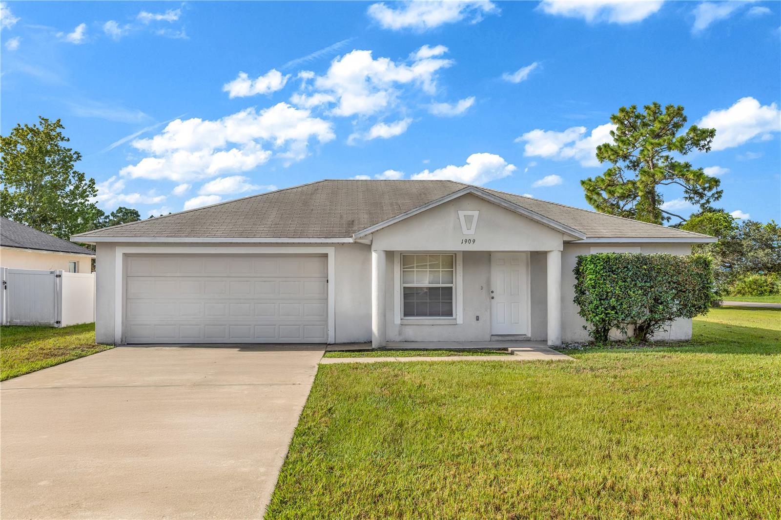 NEW ROOF and NEW AC Before Closing! Charming 3 bedroom, 2 bathroom home in Deltona, BUILT IN 2003 with 1,198 sq. ft. of living space and a desirable SPLIT FLOOR PLAN. The interior has been FRESHLY PAINTED, creating a bright and move-in ready feel.
Situated on a spacious 0.27-acre CORNER LOT, this property offers curb appeal, a generous backyard, and NO HOA restrictions. Enjoy peace of mind with NO FLOOD ZONE concerns, plus the freedom to personalize the home to your taste. Conveniently located between Daytona Beach and Orlando, you’re less than an hour from world-famous theme parks and less than an hour from the beach. With a NEWROOF and NEW AC included prior to closing, this home qualifies for FHA and VA financing—making it an excellent choice for a wide range of buyers. Priced to sell, don’t miss your opportunity!