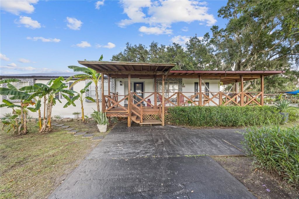 Photo of 7326 Loghouse Road, Plant City, FL 33565 (MLS # TB8417610)