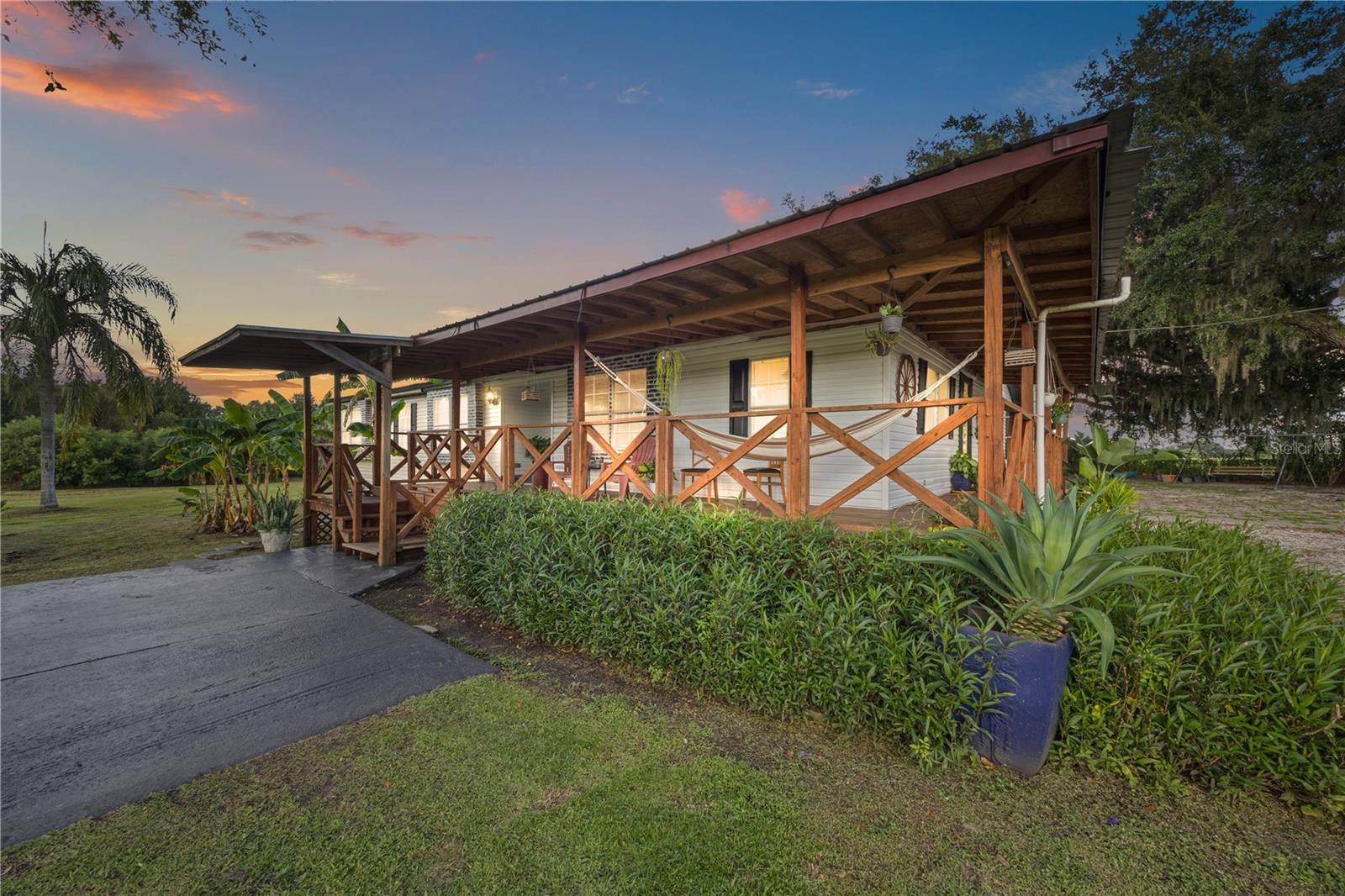 Looking for your own little piece of heaven? This property offers almost 17 acres of peaceful country living, tucked away on a private road where you’ll enjoy true privacy with no HOA and no deed restrictions. Surrounded by nature, it’s the perfect spot for anyone who wants space, quiet, and freedom… but still only 10 minutes from Hwy 301 for quick trips to town.
The home was built in 2000 and has a warm and cozy feel with wood and tile floors throughout. The kitchen comes with stainless steel appliances, making it great for cooking up family meals or hosting friends. On cooler nights, you can curl up by the wood-burning fireplace, and when the weather’s nice, the covered deck is the perfect place to relax, sip your coffee, or gather with loved ones.
If you’ve been dreaming of a peaceful retreat with plenty of space inside and out, this one’s calling your name. Come see it for yourself, you just might fall in love!