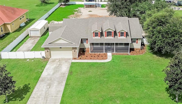 13975 MCINTOSH RD, THONOTOSASSA, FL 33592 - Image f5f2c4ee83f791ac4e39d2605f49ab6f/1178900708