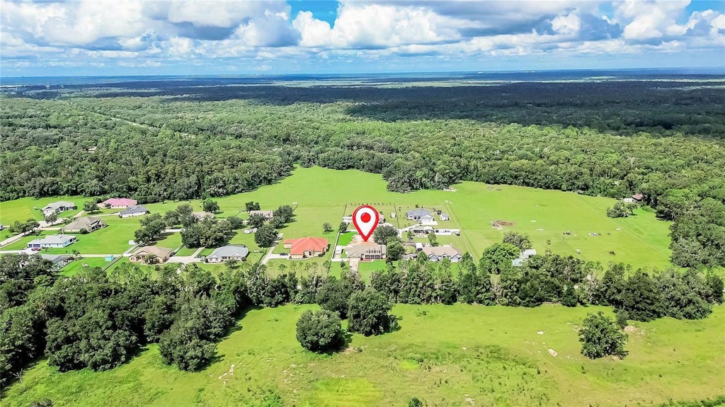 Photo of 13975 Mcintosh Road, Thonotosassa, FL 33592 (MLS # TB8535015)