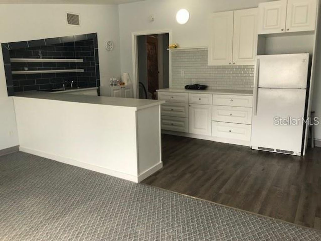 Photo of 305 Main Street #A, B, C &amp; D, Auburndale, FL 33823 (MLS # S5149131)