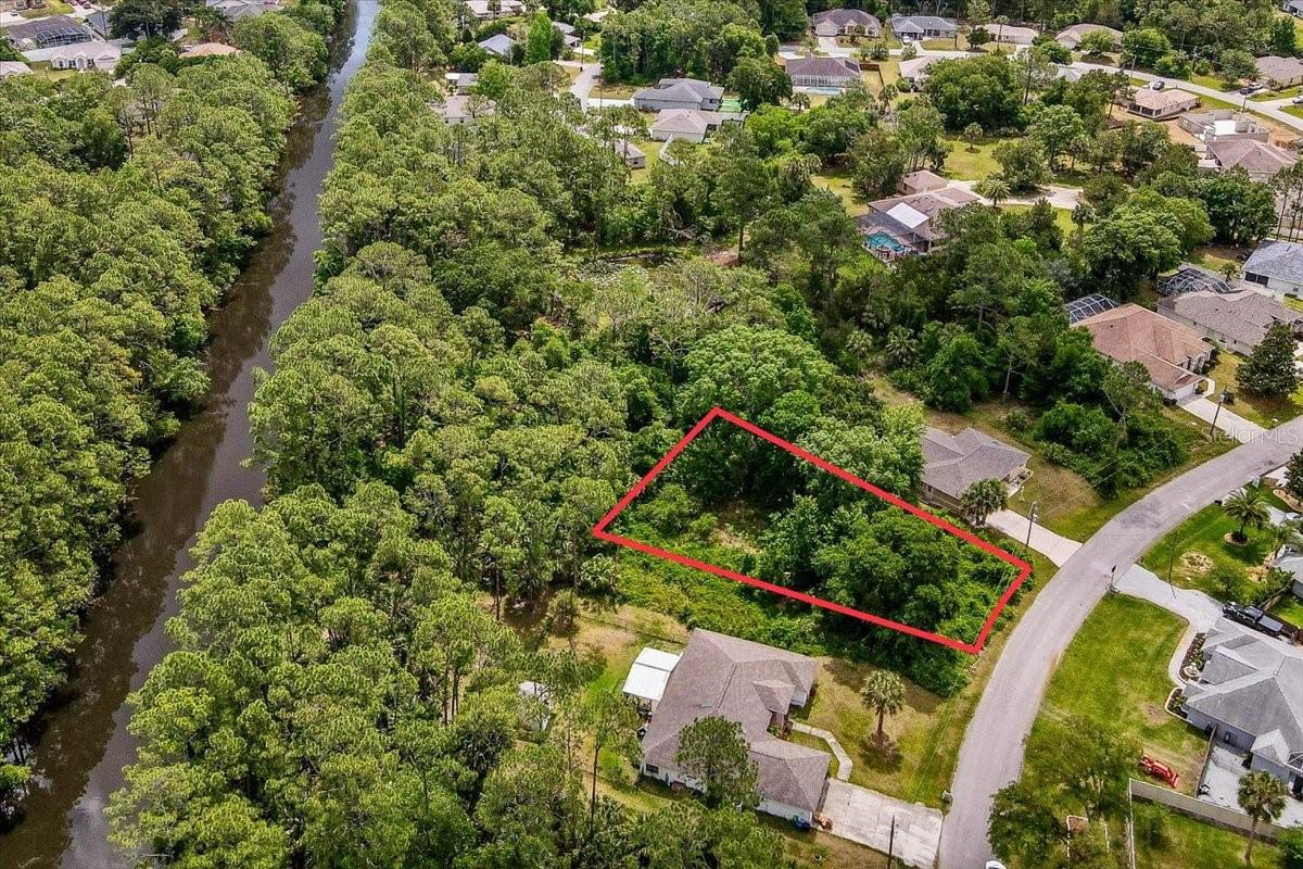 Rare find located in the heart of Palm Coast! This lot offers a great opportunity to create your dream home in a fantastic neighborhood. With the lot available next door, these lots are perfect for a spacious estate or two separate homes. Enjoy the convenience of being close to shopping, dining, and entertainment, with everything you need just minutes away. Don't miss this chance to own a piece of paradise in Pine Lakes. Call now to schedule a viewing!