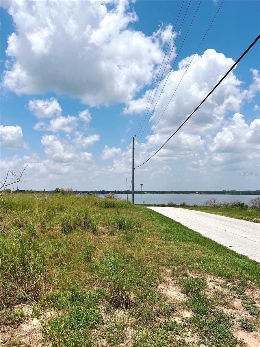 The subject property overlooks Clinch Lake is located in Frostproof, Florida, a small city known for its serene, natural beauty. This freshwater lake is popular for recreational activities such as boating, fishing, and swimming. It's a great spot for both locals and visitors to enjoy peaceful outdoor activities.
This is an incredible investment opportunity in the growing Frostproof area. This parcel has agricultural zoning and a stunning view of Lake Clinch. Its prime location near Frostproof and US 27 -98 and its features make it an excellent candidate for residential development, offering opportunities for future growth in a sought-after area. The zoning also supports farming, livestock, or other agricultural ventures, providing flexibility for various uses. Conveniently located near major routes yet surrounded by the peaceful charm of the Frostproof area, this property is a versatile and great addition to any investment portfolio. Don’t miss out on this exceptional opportunity.
590'on 9th St, 590' on Ft. Meade Road, 1,435' on Pine Ave