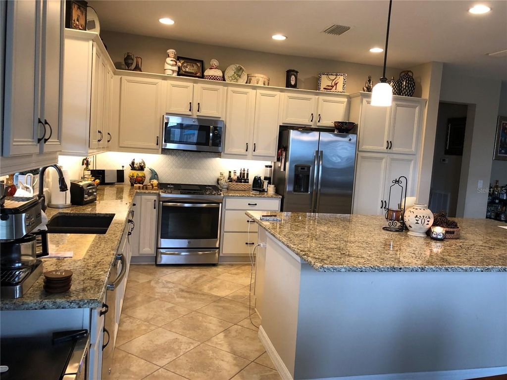 Photo of 5086 NW 35th Place, Ocala, FL 34482 (MLS # O6400479)