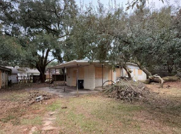 Auction Property. AUCTION. This property is a tear-down, home is boarded with NO ACCESS due to
unsafe conditions. Imagine the possibilities here. Gather your custom design ideas and make this one your next project. Current structure features 2 beds, 2 baths, and sits on a large lot offering many possibilities. Violations exist concerning demolition and maintenance. Buyer to complete all due diligence before bidding through County, Tax records where applicable. Property is sold as-is with no property disclosure or inspection reports. Buyer may be required to sign hold harmless document to purchase as-is. USE CAUTION for any exterior views. MOLD may be present. CASH ONLY SALE.