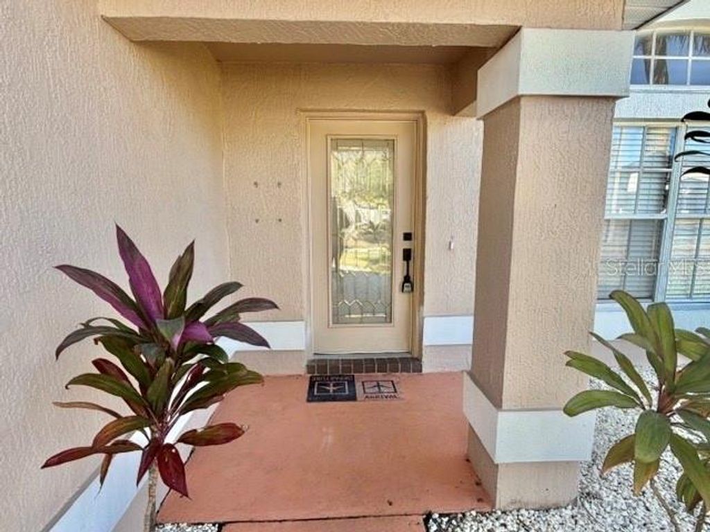 Photo of 14585 Grassy Cove Circle, Orlando, FL 32824 (MLS # S5143001)