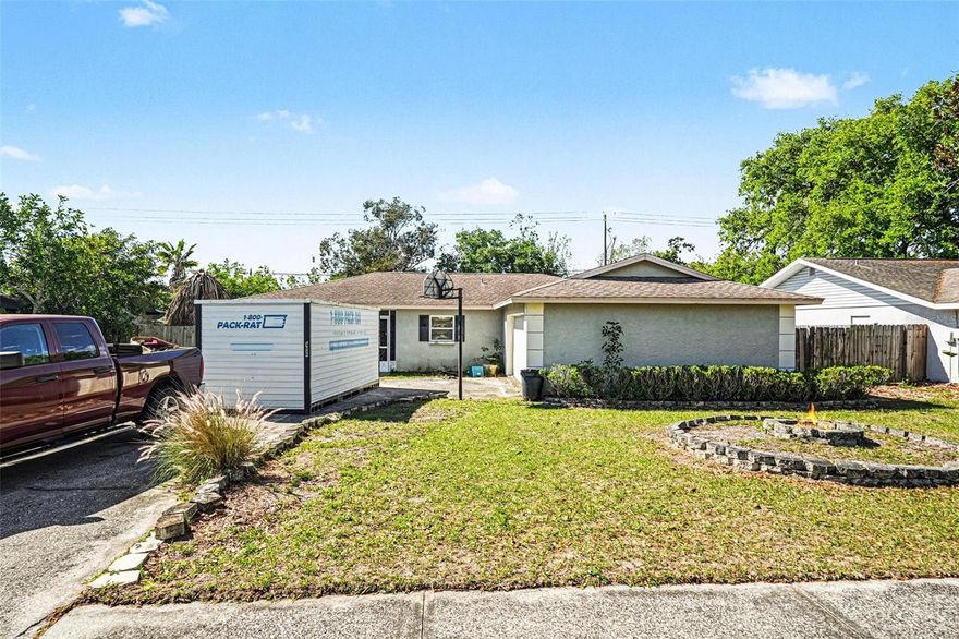 Hurry on this aggressively priced three-bedroom, two-full-bath pool home located in the desirable Sugarwood Grove neighborhood of Carrollwood. This inviting community offers a prime location with convenient access to the Veterans Expressway, major commuter routes, premier retail and dining, and various medical and cultural venues. Additionally, the area features a robust school system with several public, private, and charter options. The home itself features a functional split-bedroom design, including an owner’s suite with a private bath and walk-in closet. The interior boasts a large great room centered around a wood-burning fireplace, while the exterior offers an oversized side-turned garage and a covered rear porch leading to a caged pool on a generously sized lot. Please note that the property will require some updating and has been priced accordingly to reflect its current condition. This is an excellent opportunity for an investor or a buyer looking to add their own personal touch.