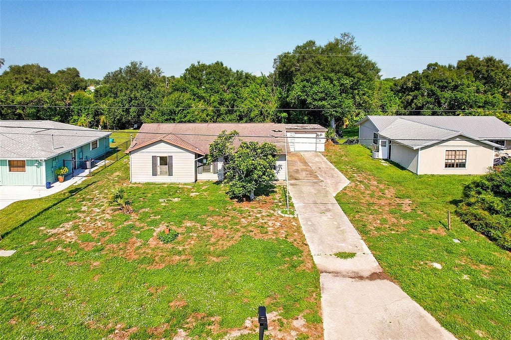 Photo of 327 Harbor Boulevard, Port Charlotte, FL 33954 (MLS # C7529579)