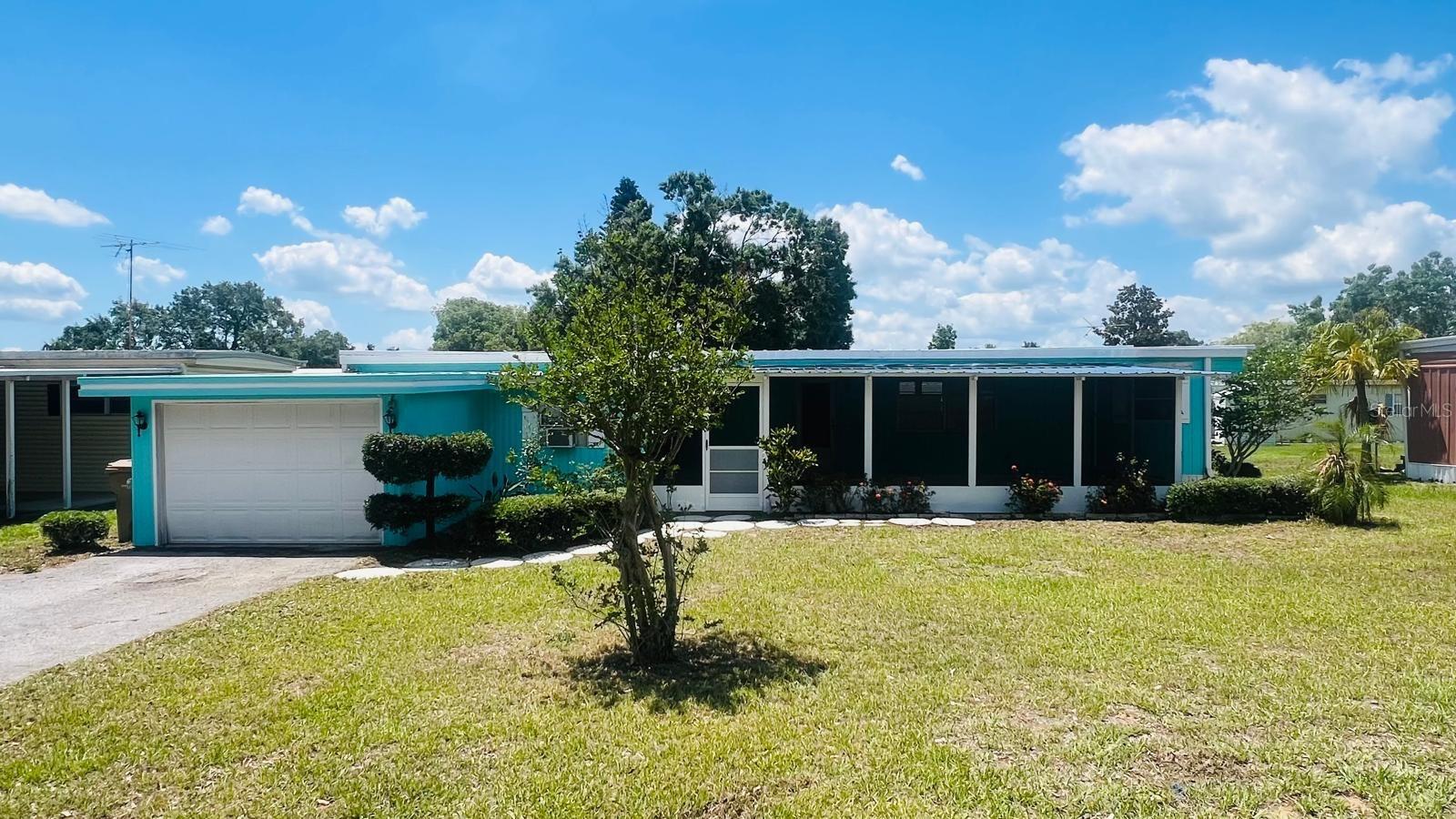 Welcome to La Dora Manor, a 55+ deed-restricted mobile home neighborhood! This mobile home boasts 2
bedrooms, 2 baths, which were recently updated. The sub-flooring was replaced; new laminated wood floors
were installed throughout the home. The kitchen has been totally re-done, featuring a double door stainless
steel refrigerator and electric counter top stove. A new water heater was installed last year(2024) as well as the
electric panel. The porch enclosure was recently replaced.
This home is located just 2 minutes from downtown Tavares and 4 miles from Mount Dora, close to shops,
restaurants, and local festivals. Residents have access to a community dock on Lake Dora.