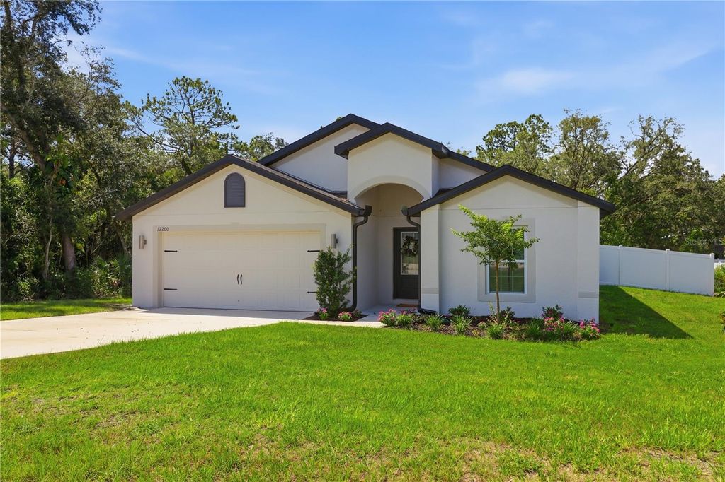 Photo of 12200 Pine Finch Avenue, Weeki Wachee, FL 34614 (MLS # TB8524284)