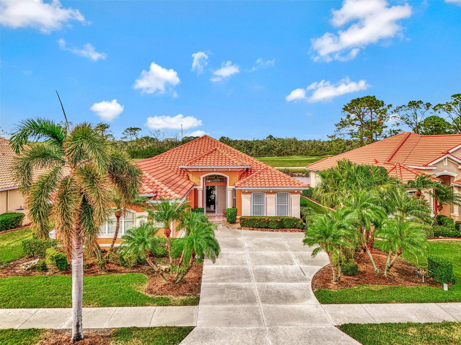 **HERON CREEK GOLF AND CC ** Tranquility Found! This simply IMMACULATE 3BED + DEN 2579 SQ FT Estate Home is like a breath of fresh air, it is light & bright, neat as a pin and is situated on a homesite w/ Premier WATER & GOLF Views! **NEW TILE ROOF (2023) ** whole house GENERATOR ** FULL HURRICANE PROTECTION** FLOOD ZONE X (flood insurance mot required) This quality-built Ryland home has a thoughtfully designed floorplan that is well suited to easy living & entertaining alike. It features 3 BEDROOMS, 2 BATHS, a Large DEN that could be converted to a 4TH BEDROOM, a spacious Island kitchen, formal dining room, private primary bedroom with en suite, a central Great room, a fabulous 4 seasons FLORIDA ROOM, extended lanai &side load 2CAR GARAGE. With almost 2600 sqft of living space under air the OPEN CONCEPT design flows seamlessly making entertaining & relaxing effortless! This homes curb appeal is off the charts from the lushly landscaped lot to the new barrel tile roof to the high arched columned entry and a bevy of eye-catching architectural details this home will certainly turn the heads of even the most discerning buyers! Once you walk in through the double entry door it's like a Zen like calm envelopes you....because you feel welcomed, you feel at home! She’s full of good happy vibes and you can tell she’s been loved and meticulously maintained! This home is so light and bright and open, with high tray ceilings painted in watery blue, cool ceramic tile flooring through the main living areas, and crisp classic a neutral paint color that lets the decor set the scene for comfort & serenity. Upon entering the foyer, the den is to the right and makes a great home office or could be a hobby or craft room. There are 2 guest bedrooms w/shared bath that will make visitors feel right at home, there is also a dedicated laundry room, a dining room that seats 8-10, an island kitchen w/ a breakfast bar and a sun filled dinette overlooking the lake & golf course! The island kitchen has classic light maple cabinets with pull-outs, 2 pantries, a convenient built in desk, newer appliances, (NATURAL GAS is available at range ) and classic solid surface counter tops. The Great Room Opens wide to the gorgeous all seasons FLORIDA ROOM complete with HIGH IMPACT GLASS bringing the outside in. There is a wonderful, screened lanai area off of the Florida room where you can lounge in the sun or spend an eve taking in a majestic sunset! The Primary bedroom also has access to the Florida room. The primary features easy care laminate flooring, tray ceilings, a picturesque stained glass clerestory window & walk-in closet. The en suite features a garden tub, spacious shower, & dual vanities. NOTE: There is ample room on the lot to build the pool of your dreams or simply enjoy the Club pool for carefree living! Heron Creek offers exceptional amenities including a 21,000 sq ft club house, 27 holes of Championship golf Arthur Hills design, resort style pool & spa, a robust social activity calendar, fitness center, Tennis courts & formal & casual dining options! Club Membership is required w/3 membership levels offered beginning at $259/month.*NO CDD FEES * LOW HOA FEES include lawn care, trimmings mulching, irrigation, Cable & HIGH-SPEED INTERNET & Gated entry, conveniently located w/easy access to I-75 &US-41, the Cocoa Plum Shopping , myakkahatchee Creek trails, Blue Ridge Park, WELLEN PARK, Braves Stadium, COSTCO & the SMH health SYSTEM