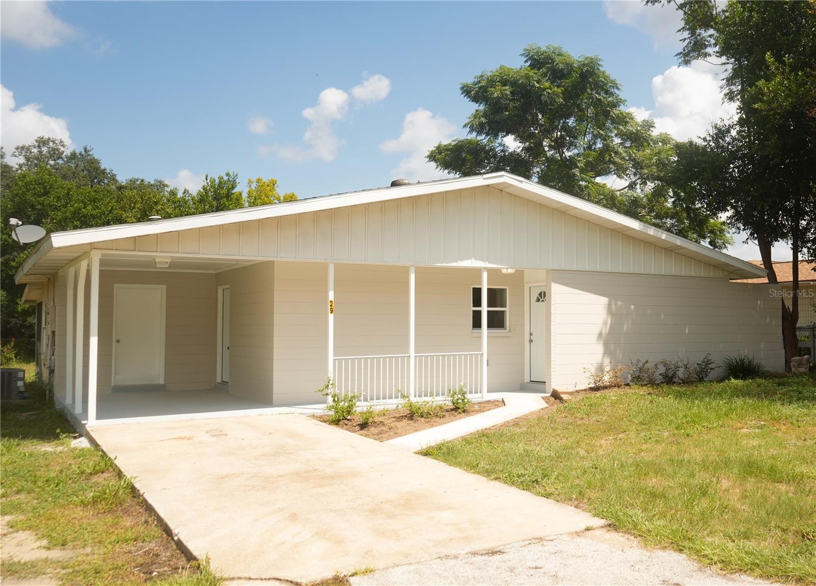 Fully Updated & Move-In Ready | 29 Lake Court Loop, Ocala, FL 34472 - This is the one you’ve been waiting for—fresh, clean, and completely updated! Located in a quiet, established neighborhood in Silver Springs Shores, this charming home offers the perfect blend of comfort, functionality, and style. Step inside to find a bright, open layout with brand new carpet, a freshly painted interior, and updated features throughout. The kitchen has been fully remodeled, featuring new cabinets, countertops, and appliances—everything you need to cook and gather with ease. The bathroom has also been completely updated, giving it a fresh and modern feel. Every room has been thoughtfully refreshed to give you a truly move-in ready space—no projects, no hassle. Just bring your furniture and start enjoying life. The backyard offers plenty of space for weekend barbecues, gardening, or relaxing under the Florida sun. Whether you’re a first-time buyer, downsizing, or looking for a smart investment, this home is a must-see. Located minutes from shopping, dining, medical services, and Lake Weir, with easy access to downtown Ocala and The Villages. You're also not far from hiking and biking on the Florida Greenway. And, located in the heart of Central Florida you're never too far away from the Santos Trailheads, Florida's amazing natural springs, Florida's famous beaches, and so much more that Florida has to offer. New kitchen. New bathroom. New flooring. All that’s missing is you. Contact your local trusted real estate consultant for a private tour today.