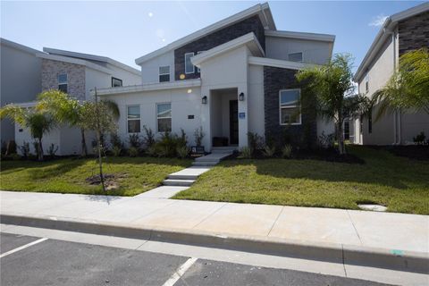 Photo of 840 Drop Shot Drive, Davenport, FL 33896 (MLS # O6408621)
