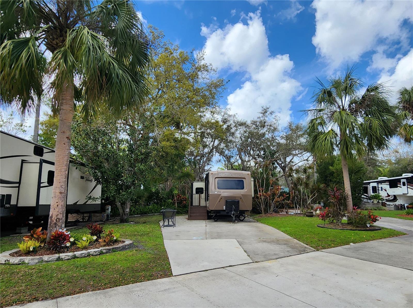 Welcome to 257 Saddle Lane, a premium luxury RV lot in phase 2 of River Ranch RV Resort! This spacious and well-appointed lot offers convenience, privacy, and resort-style living in one of Central Florida’s top RV destinations.
Property Highlights:
Expanded Lot Pad – Widened for ample space to accommodate your RV and outdoor setup; Full-Sized Storage Shed – Perfect for extra storage and organization; Prime Location – Minutes from: Trails End Clubhouse, Phase 4 Pool & Hot Tub, Showers & Restrooms, Pay Laundry Facilities; Located adjacent to Westgate River Ranch, offering: Two On-Site Restaurants, Starbucks, Exciting Activities & Entertainment (additional fees apply). This luxury RV lot provides everything you need for an unforgettable getaway. This is your chance to own a piece of Florida paradise!
RV and Golf Cart Sold Separately
