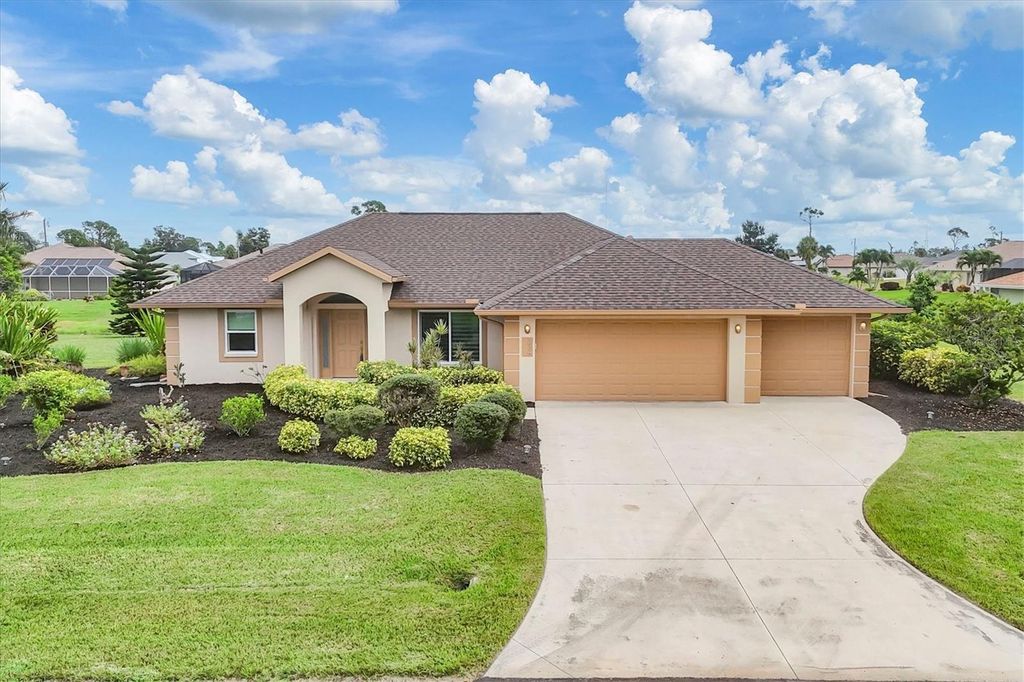Photo of 236 White Marsh Lane, Rotonda West, FL 33947 (MLS # D6143826)