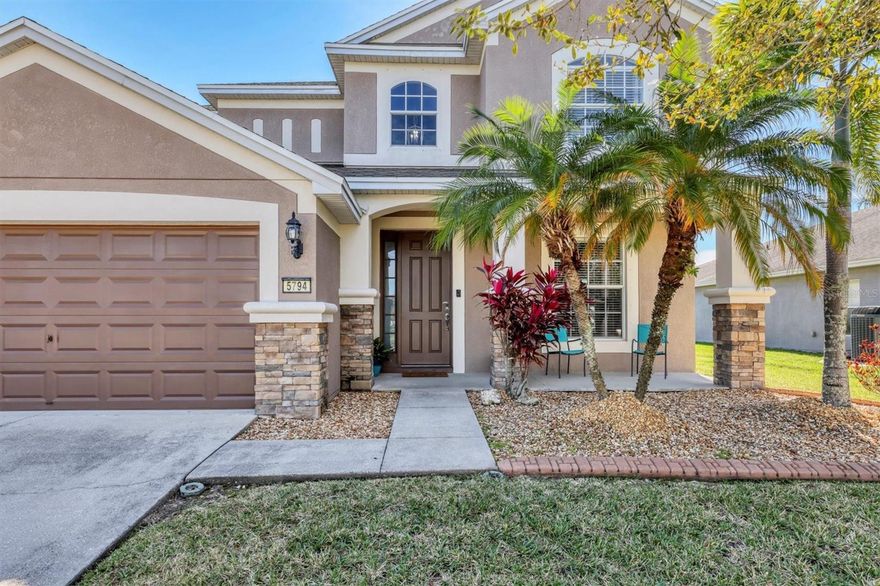 Step into the heart of Harrison Ranch, nestled on an ideal lot with a captivating water view, this 4-bedroom, 3.5-bath, 2 car garage home redefines living.   A stunning vaulted entrance with open staircase greets your guests with a sense of grander. Work from home from the office through double doors for privacy and convenience. Picture yourself in the spacious, screened lanai—an outdoor haven designed for serene relaxation and open-air gatherings.
The home has been well maintained with a new AC in 2022 for those warm, sunny days. Speaking of sun, you’ll be delightfully surprised by the practicality of a solar system, ensuring a greener, cost-efficient energy solution.
Harrison Ranch goes beyond your doorstep, providing community amenities such as a 24-hour gym, a heated pool, playground, dog park, activities director, tennis and basketball courts as well as miles of nature trails. 
Centrally located, Tampa, St. Pete, and Sarasota are within 45 minutes drive, making this residence a hub of convenience. Publix  and other shopping are also a short drive away. Welcome home to Harrison Ranch—a community where comfort, convenience, and natural beauty converge seamlessly. Bedroom Closet Type: Walk-in Closet (Primary Bedroom).