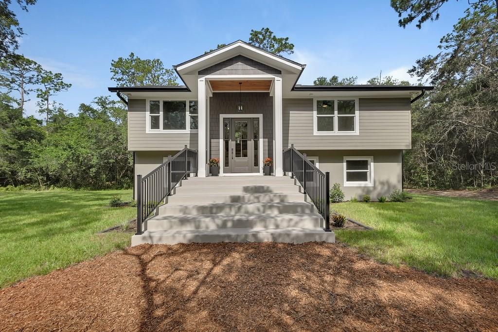 Photo of 1530 Deer Moss Lane, Deland, FL 32720 (MLS # V4950022)