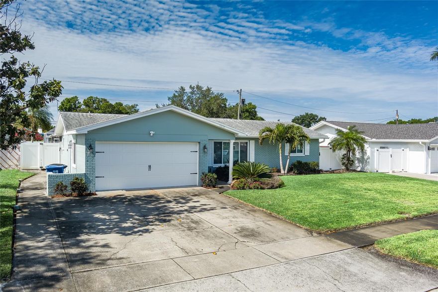 Come enjoy the Florida Lifestyle in this 4 bedroom, 2 bath pool home boasting more than $134,000 in home improvements (details attached)!! Located in the highly desirable Holiday Park neighborhood, this charming, split floor plan invites you in the moment you walk in the door. Home features include a large living room, modern kitchen with granite counter tops, primary bedroom retreat with updated en-suite bath and access to pool lanai, guest bedrooms located on other side of home for privacy, LED lights in both showers are also Bluetooth speakers, and a family room with sliders to the pool area. Relax or entertain on the large, covered lanai and cool off in your sparkling pool with a tropical drink. The spacious backyard has a privacy fence, so your furry family members can roam undisturbed. Solar panels (owned) help keep utility bills low. This property is located just minutes away from World Class beaches, parks, medical facilities, and the Tyrone shopping corridor, offering numerous dining, shopping and grocery options. Nearby airports include St Pete/Clearwater and Tampa International. Schedule your private showing today!!!