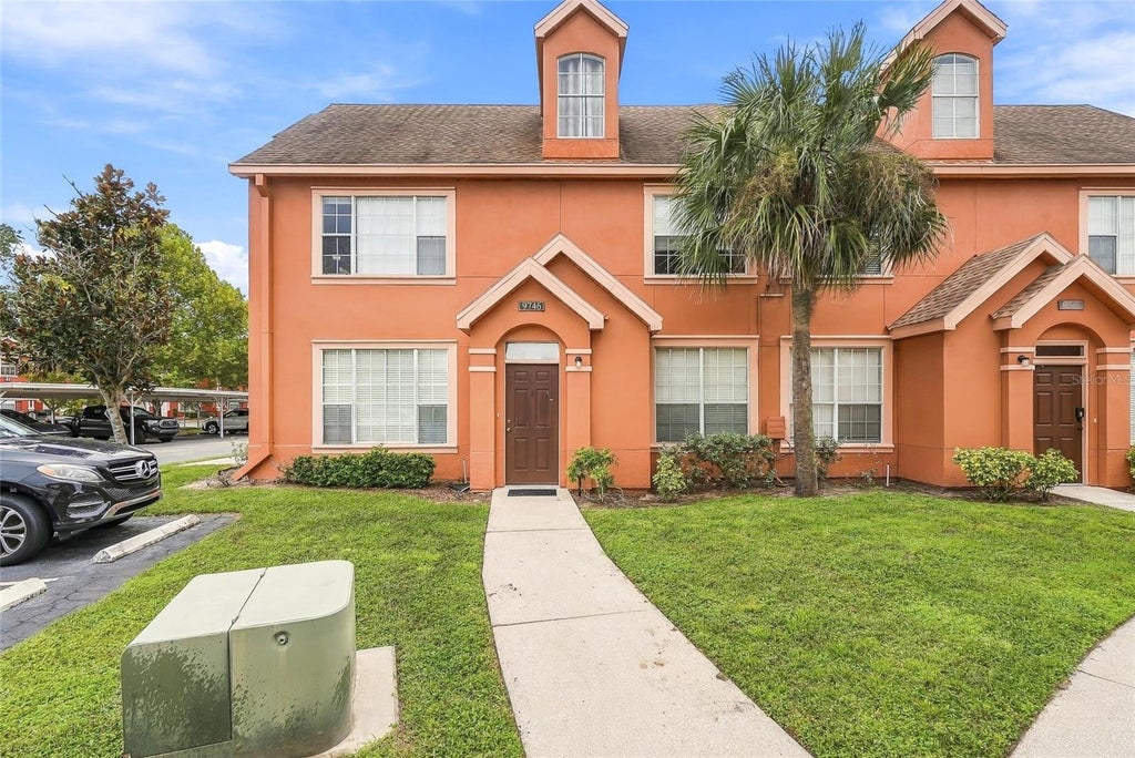 Photo of 9746 Lake Chase Island Way, Tampa, FL 33626 (MLS # TB8563284)