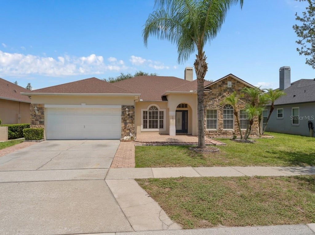 Photo of 13821 Amberleigh Road, Orlando, FL 32837 (MLS # S5154308)