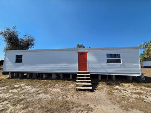 Photo of 1040 W Frostproof Road, Frostproof, FL 33843 (MLS # TB8478259)