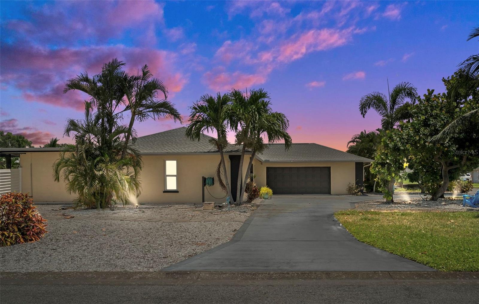 Come and explore... Fall in love!! Experience coastal living at its best in this stunning, fully furnished 3-bedroom, 2-bath pool home, nearly 2,000 sq. ft., located in the heart of West Bradenton’s highly sought-after Village Green Community. With no HOA (voluntary), no CDD fees, and NO FLOOD insurance required, this move-in-ready treasure is ideal for year-round living, a winter getaway, or as an INCOME -GENERATING rental property! The opportunities are limitless! Amazing AIRBNB potential – earn an estimated $80,000-$100,000 per year!
Upon arrival, you will be greeted by a beautifully landscaped entrance bursting with vibrant Florida colors. As you step inside, you will be enchanted by the charm and beauty this lovely home offers, featuring an open and inviting split floor plan. Every room in this delightful residence showcases meticulous attention to detail, creating a warm, elegant, and relaxing ambiance. It boasts an updated, spacious culinary haven perfect for even the most discerning chef, complete with ample newer cabinetry, sleek modern hardware, newer appliances, and generous granite countertops for preparing your favorite family meals. Ideal for entertaining, the combined kitchen bar and roomy family area overlook the private, stunning resort-style pool and expansive paver-bricked lanai, surrounded by lush tropical landscaping and offering sweeping views through its beautiful, picturesque sliding glass doors. The thoughtful design includes a split bedroom layout, ensuring privacy and versatility. Two large guest bedrooms, freshly painted with newer flooring, and an updated, spacious guest bath nearby. Retreat to your generously sized primary suite, featuring sweeping, tranquil views of the inviting pool and patio adorned with enchanting lush landscaping. Enjoy a substantial walk-in closet, a beautifully remodeled en suite bath, ample vanity cabinetry and counter space, a sleek sliding glass shower door, new flooring, and updated lighting – all presented in a neutral, modern palette.
This residence is located just a few minutes from medical facilities, dining options, and the famous GT Bray sports and recreational complex, while also being conveniently close to shopping and schools. The location is highly central and accessible.
Moreover, the Gulf beaches of Anna Maria Island, Robinson’s Preserve, Desoto National Park, and Palma Sola Botanical Garden are only a short drive away, offering endless opportunities for enjoyment. Experience peace of mind with the numerous updates this exceptional home offers, including a NEW ROOF installed in 2023, along with additional enhancements such as an HVAC heat pump, a 200 AMP electric panel with surge protection, and a Hayward pool heater heat pump, variable speed pump, and navigator suction cleaner. The backyard features a lush, updated landscape.
Step outside to relish the expansive pool area, which includes various seating options—ideal for unwinding on sunny summer days. The brick paver patio extends the outdoor living area, making it perfect for BBQs, fire pit gatherings, or simply basking in the Florida sunshine. The large, FENCED yard provides ample space for pets or outdoor activities.
Enjoy watching the beautiful video and call today! Quick Occupancy Available! ! Your Coastal Dream Home is Calling—Schedule a Showing Today!