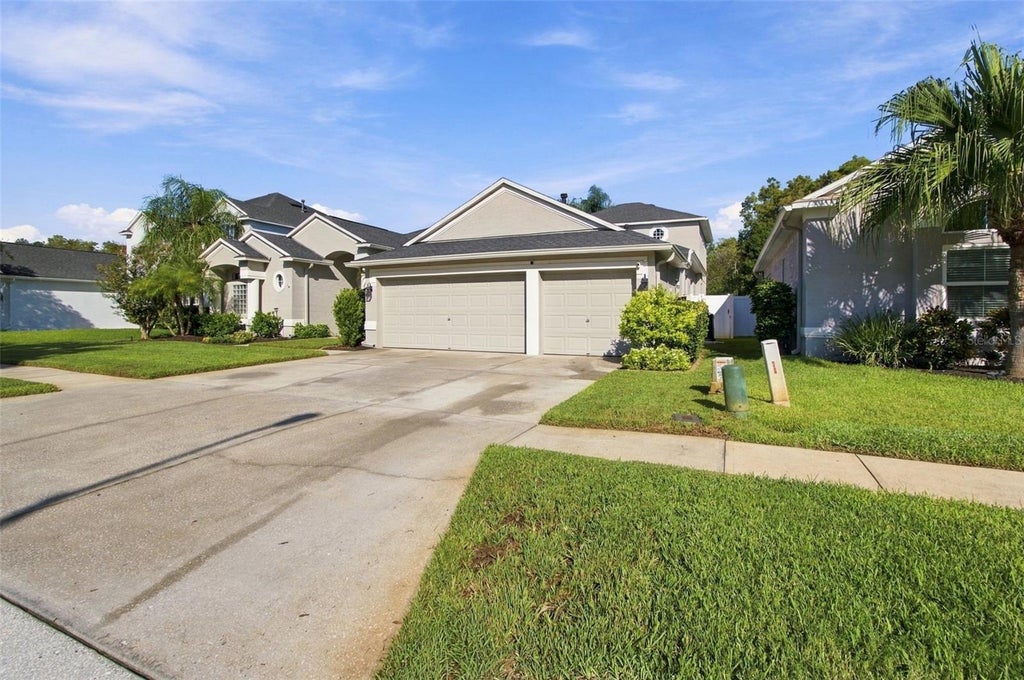 Photo of 3125 Ashmonte Drive, Land O Lakes, FL 34638 (MLS # W7889475)