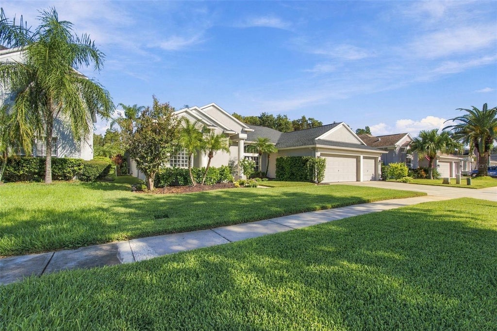 Photo of 3125 Ashmonte Drive, Land O Lakes, FL 34638 (MLS # W7889475)