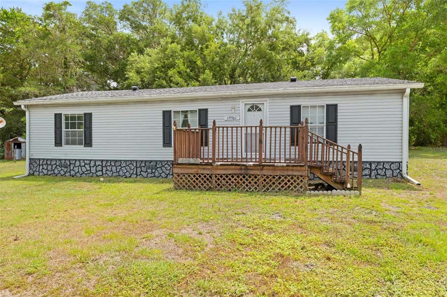 Peaceful country living just 5 minutes from the heart of Brooksville! 

Situated on a fully fenced 1/3-acre lot, this 3-bedroom, 2-bath mobile home offers privacy, space, and endless potential. 
Nestled in a quiet rural setting, the property provides plenty of room for pets, gardening, outdoor activities, or simply enjoying the peaceful surroundings.

Inside, the home features a functional layout with spacious living areas and split bedrooms. While the home does need updating, it presents a great opportunity to add your personal touch and make it your own. A new roof was installed in 2015, offering added value and peace of mind.

Whether you're looking for an affordable primary residence, investment property, or a quiet retreat close to town, this property combines country charm with convenience.
