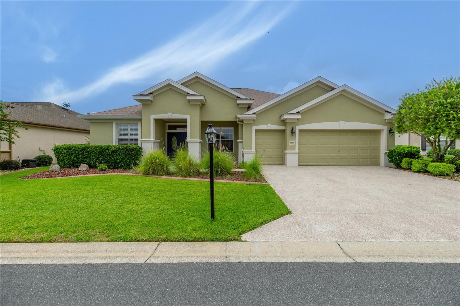 Welcome Home to this amazing property in Del Webb's Spruce Creek Golf and Country Club in Summerfield. Located in Sherwood, the final phase and most recently built and convenient to the rear guard house. Home features 3 bedrooms, 2 large baths plus a flex room with French doors ideal den/ 4th bedroom / or office to work from home. Enjoy this rare Lexington Model - one of the largest floor plans available with 2,812 living sq ft. plus an additional climate controlled 610 sq ft enclosed Florida Room with glass windows and recent Mitsubishi Mini Split. Enjoy morning coffee on the covered front porch. Lovely double front door entry to a large foyer, living room and formal dining room. Chef's gourmet kitchen opens to large great room. Can easily host large family gatherings with the Range oven plus double wall ovens equals total of 3 convection ovens with plenty of counter and cabinet space and bonus pantry built in the laundry room. This generous floor plan is perfect for entertaining while the split bedrooms offer privacy from guests. The primary suite is a relaxing retreat with trey ceilings, spa like ensuite and walk in closet. The garage has additional golf cart garage to best enjoy everything this amenity rich and active community has to offer. Such as guard houses, community pool, club house and restaurant, Active golf community with four 9 hole courses to enjoy, fitness, tennis, and much more. *There is a custom Gators Golf Cart that is available and negotiable for our Gator fans!* The backyard has custom landscaping offering privacy and a paver patio for grilling. Recent updates include: Solar tubes 2021, HVAC and Mitsubishi Split in 2022, NEW ROOF 2023, Coated front porch and driveway. Other features to note: Crown molding, Plantation shutters, large closets for all of your storage needs, most mechanical systems are Wifi / phone controlled and Central vacuum all add to the charm and allure of this property. Enjoy this amazing location and all of the nearby amenities of The Villages such as restaurants, shopping, medical, etc. but with a much more reasonable HOA of $211 / month. (Spruce Creek Golf and Country Club is a 55+ community with 80% of residency age required but leaving 20% of residency open to all ages without children under 18 years old.) We look forward to sharing everything this amazing property has to offer. Give us a call for your private showing and start enjoying your Florida lifestyle.