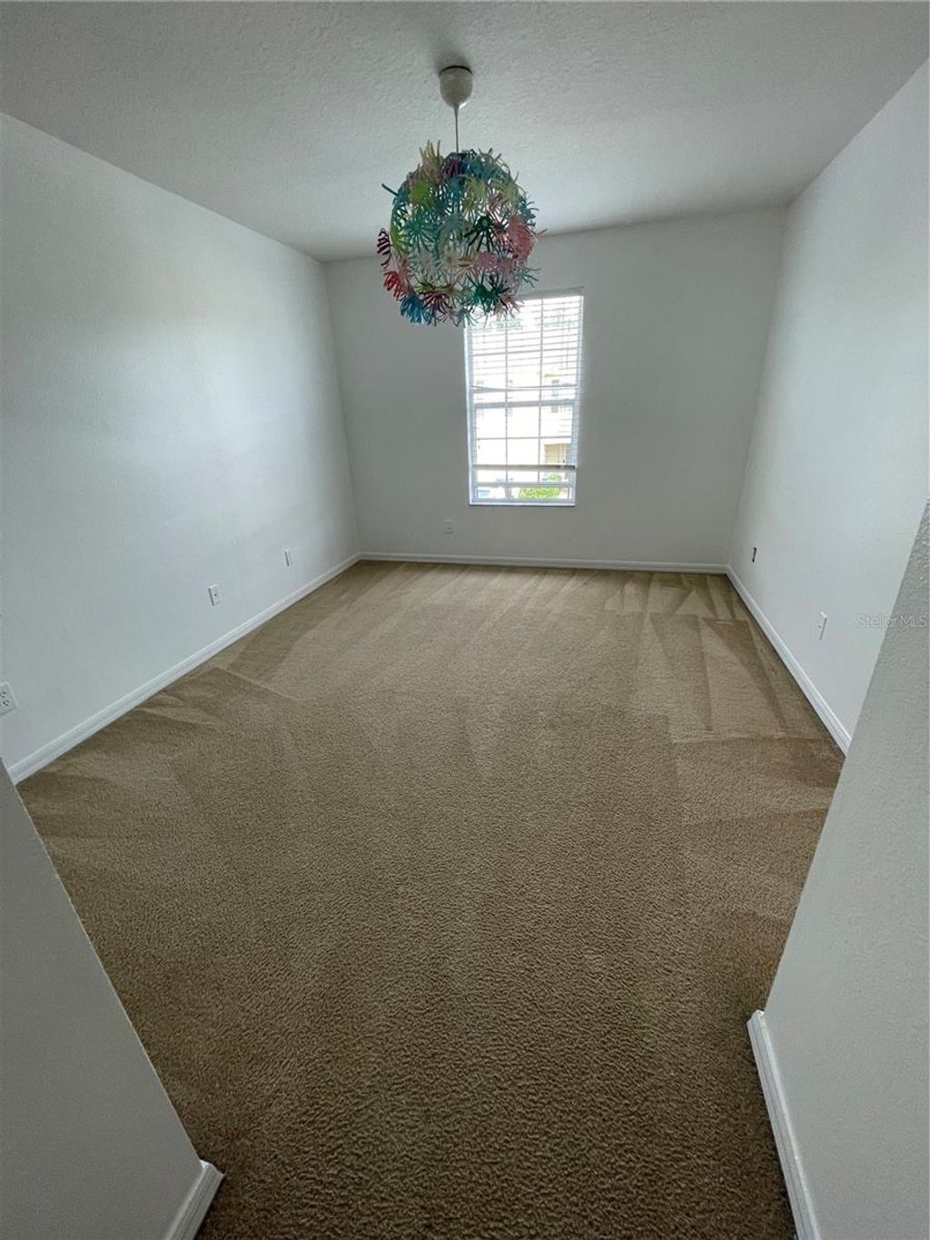Photo of 765 Cresting Oak Circle #127, Orlando, FL 32824 (MLS # O6355062)
