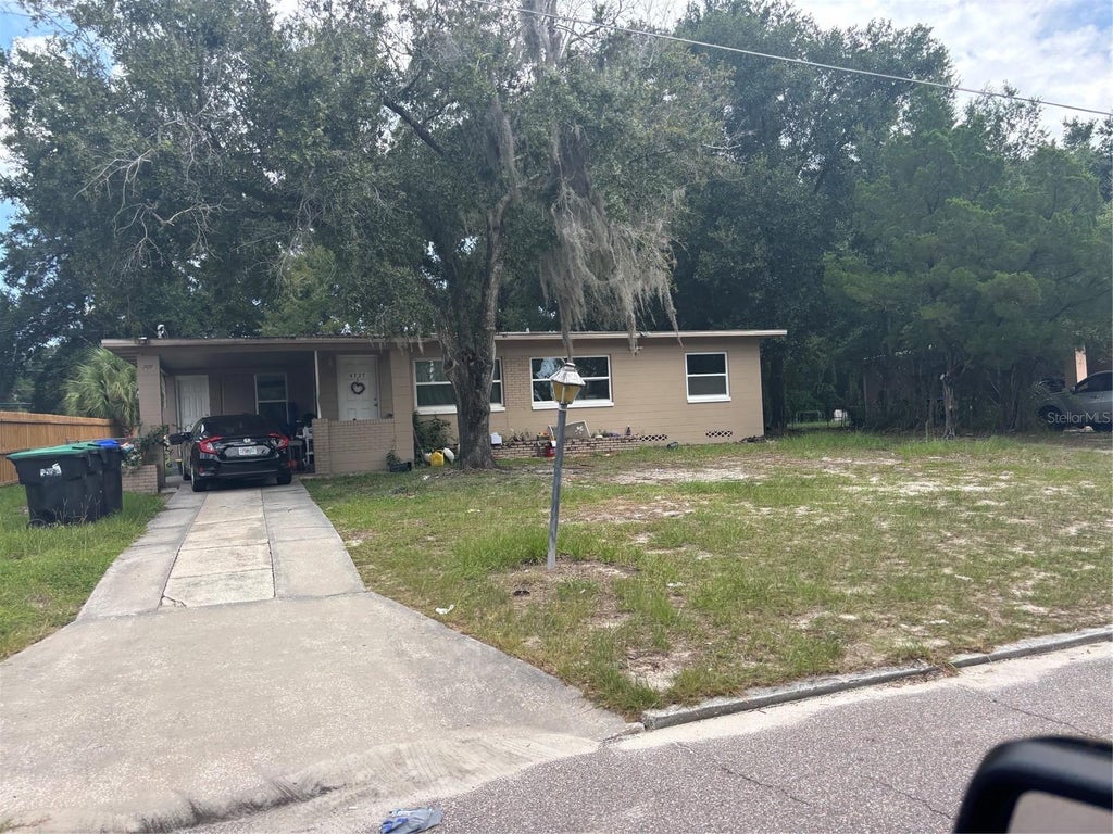Photo of 4727 Abaca Street, Orlando, FL 32808 (MLS # O6434885)