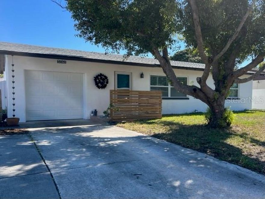 PRICE REDUCED!!!   This Home is a great find for first time home buyer or empty nester. When you walk into the home you can see the pride of ownership as it is well maintained.This home features a new roof in August of 2023, an air conditioner is 3 yaers new and and the hot water tank is 2 years new, plus the family room has a newer hurricane rated window. Owner has installed a new Garage door and is installing a new side door. The Kitchen is a delight tp cook in as it has a solid surface counter top with wood cabinets, a microwave above the stove and is open to dining room. The pool sized back yard is enclosed with a privacy fence for great entertaining and already has a lovely patio for grilling. The home is in a great location as it is close to the beaches, shopping, restaurants, doctors and churches and an easy commute to St. Petersburg, Clearwater and Tampa. This Home is walking distance to Keswick Elemtary School.  It does not get better than this in our tropical paradise.