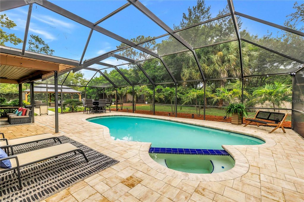 Photo of 10210 95th Street, Seminole, FL 33777 (MLS # TB8531571)