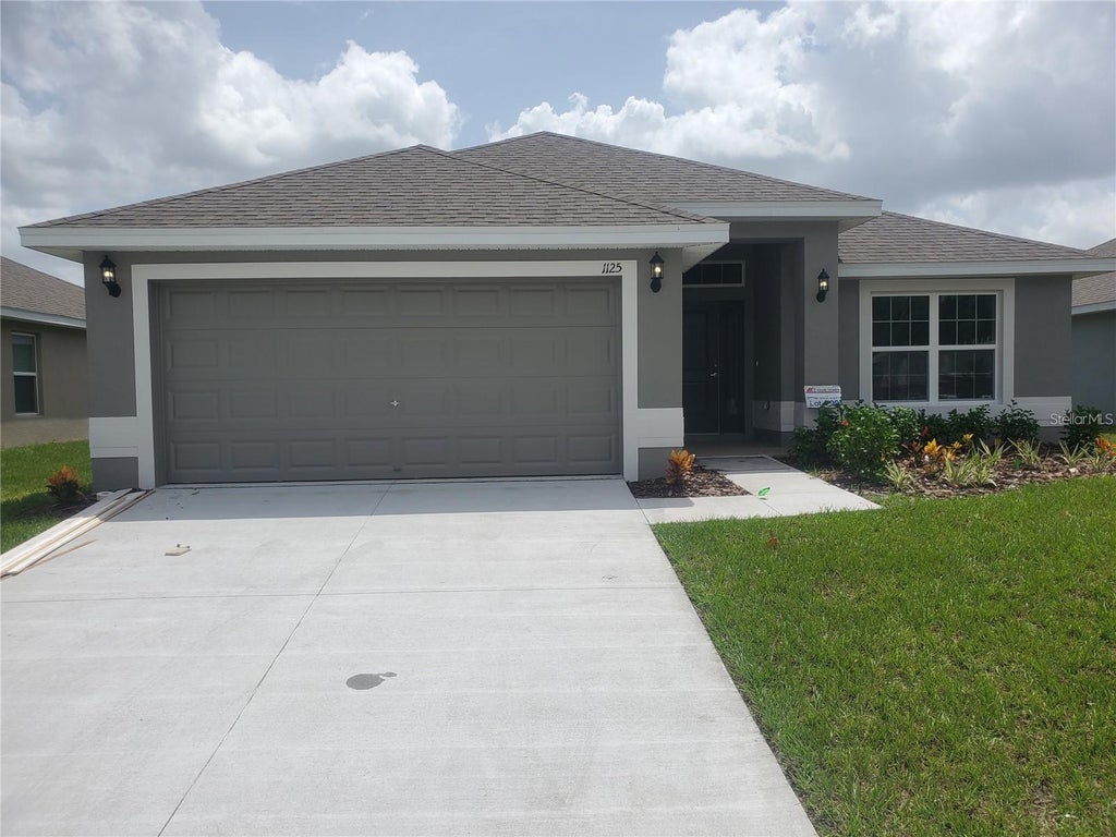 Photo of 910 Sofia Lane, Davenport, FL 33837 (MLS # O6449277)