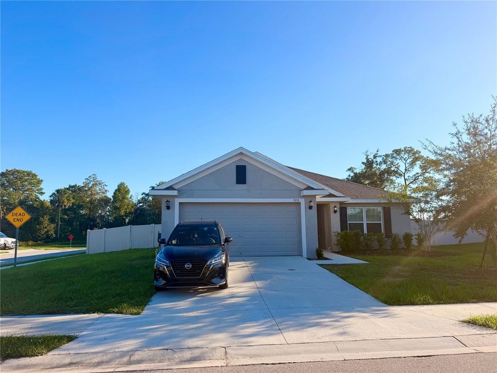 Photo of 910 Sofia Lane, Davenport, FL 33837 (MLS # O6449277)
