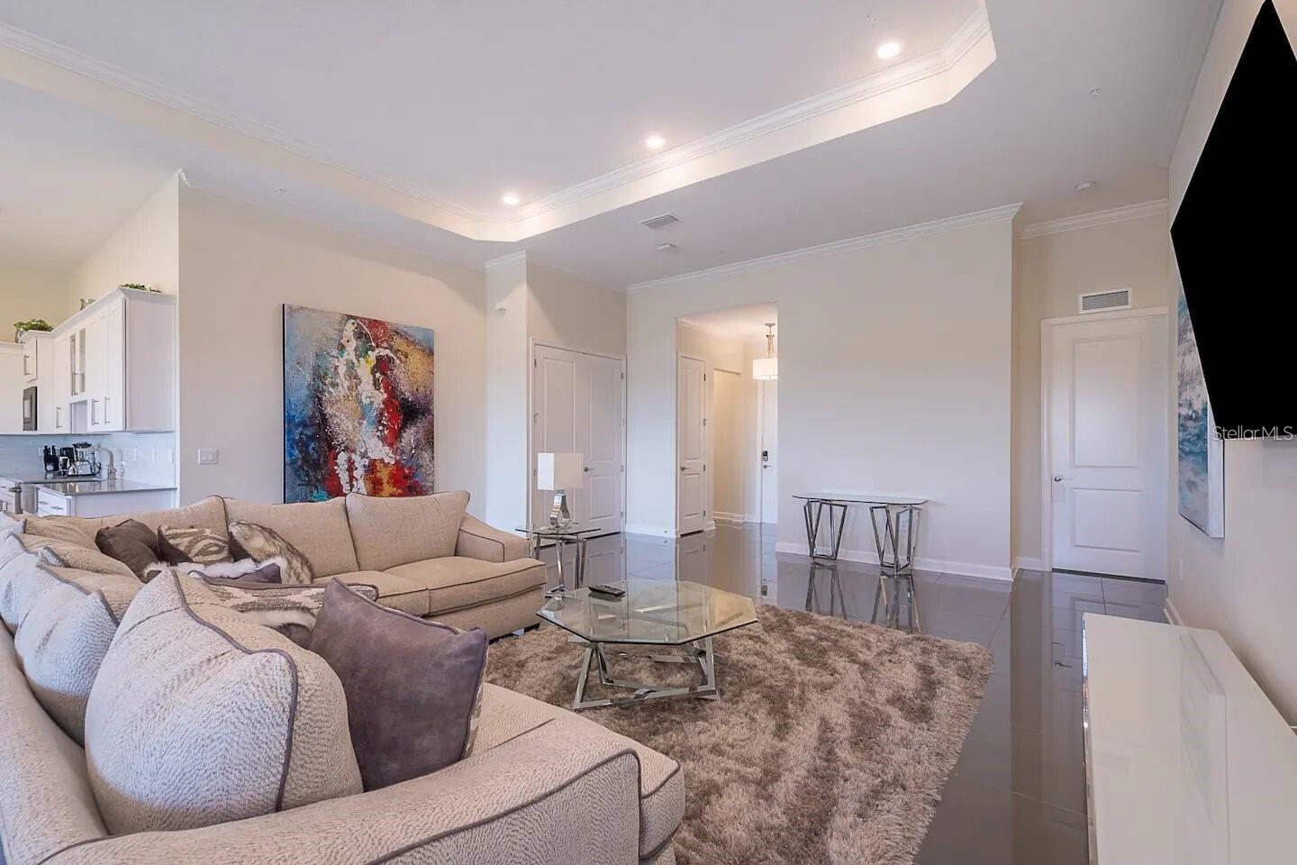 Luxurious PENTHOUSE with 4 Bedrooms and 3 Bathrooms This elegant kitchen is a chef’s dream, featuring top-of-the-line appliances and sleek finishes. The well-appointed bedrooms offer privacy and serenity, while the bathrooms showcase modern fixtures and luxurious details throughout. This is a GREAT property to enjoy as a primary HOME or to generate additional RENTAL INCOME.
Welcome to the best-located community in Storey Lake. Amenities include a tiki bar and grill, canoe and kayak rentals, lazy river, fitness center, mini-golf, large Disney-style pool, splash pad, waterslide, volleyball court, sports court, Storey Lake is one of the closest resort communities to Walt Disney World, just 10 minutes away. Located 3.5 miles from Disney Springs, 3.2 miles from Orlando Premium Outlets, with a wide variety of nearby restaurants. For added convenience, the condo is only 15 miles from Orlando International-The property is currently being rented short-term, with excellent reviews and strong occupancy rates. As Super Hosts, the owners have maximized rental potential. There are only 12 PENTHOUSES in the entire community, and this unit is the finest contemporary penthouse — fully furnished and currently available. It’s an ideal investment for a vacation home and also a great source of passive rental income. Owner Financing Available