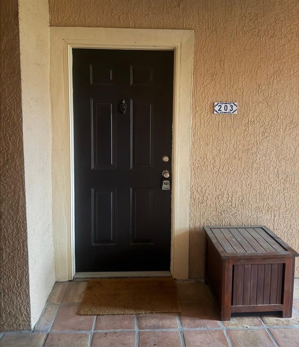 Photo of 5572 Metrowest Blvd #203, Orlando, FL 32811 (MLS # O6432022)