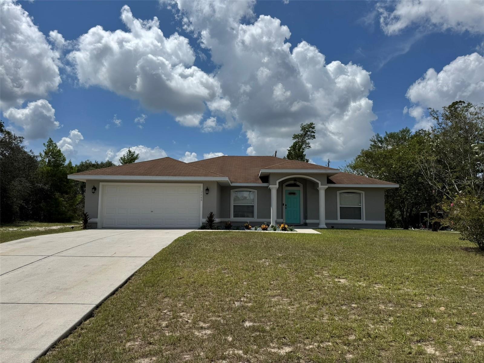 This beautifully maintained 3-bedroom, 2-bathroom, plus office/den home offers 1,818 sq ft of bright,open living space on a
generous half-acre lot in the desirable Marion Oaks community. The open-concept design, soaring ceilings, and split floor plan
create a welcoming and functional flow throughout. In addition to the main living areas, the home features a versatile den/office/flex room with stylish barn doors ideal for remote work, creative space, or added privacy. Recent updates include a
freshly painted exterior, refreshed landscaping, newly painted interior living spaces, and a fully remodeled guest bathroom
featuring a luxurious deep soaking tub. The kitchen shines with a sleek new backsplash and pendant lighting over the peninsula, while the remodeled laundry room adds convenience with updated cabinetry. New luxury vinyl plank flooring in the
guest rooms means the home is completely carpet-free. Additional highlights include central air, a smart thermostat, and an attached 2-car garage. With no HOA and a location just 15 minutes from I-75, this move-in-ready home blends thoughtful
upgrades with everyday convenience. New roof prÃor to closing with full price offer and seller is offering a home warranty.