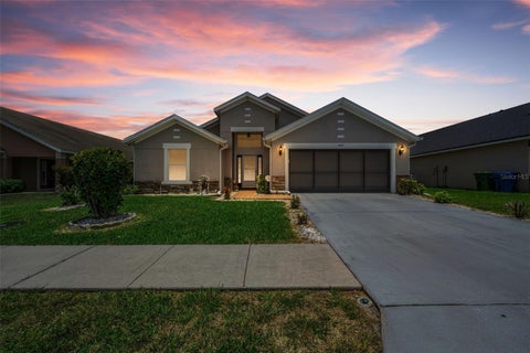 Photo of 6549 Crescent Loop, Winter Haven, FL 33884 (MLS # TB8523412)