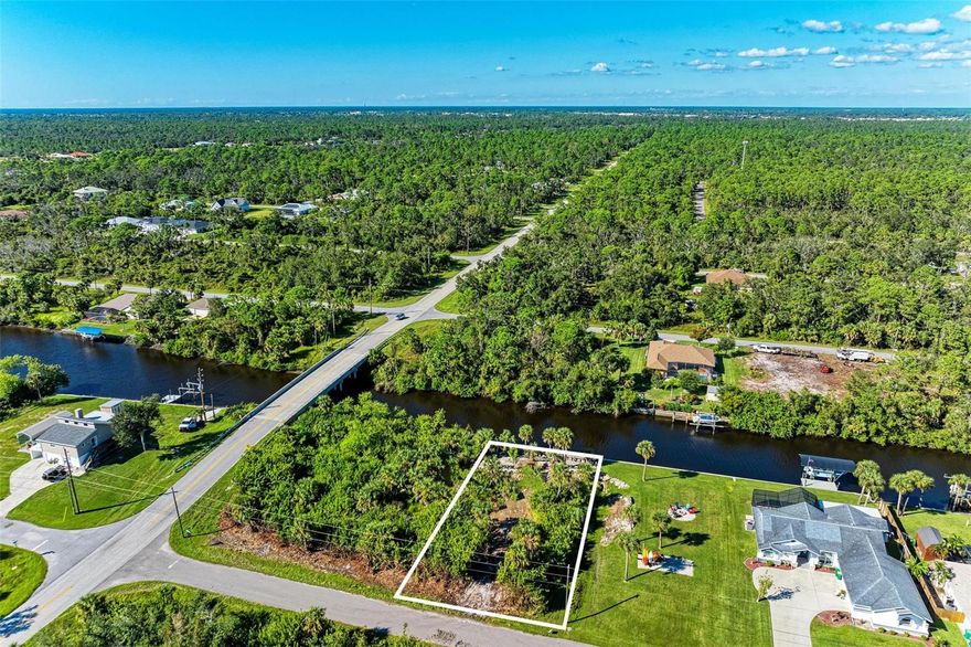 Welcome to this exceptional piece of paradise, with a BRAND NEW CONCRETE SEAWALL and an 80x125 built to suit lot nestled along the beautiful Jupiter Waterway! This vacant lot offers an incredible opportunity to create your dream waterfront oasis. With its prime location and tranquil water views, this property truly embodies the perfect blend of serenity and convenience. This picturesque canal frontage not only provides a calming atmosphere but also offers direct access to mesmerizing waterways to include the Myakka River and Peace River - boat on down to Charlotte Harbor, Boca Grande, and make your way out to the Gulf of Mexico! Your boating options are endless at this location. Beyond the beauty of the waterfront land, you will also appreciate the convenience and accessibility it offers to Englewood Beach, Manasota Key, Warm Mineral Springs, Myakka State Park, Deer Prairie Creek Preserve, shopping, dining and entertainment. Come build your dream oasis here! Seller will consider a JV.