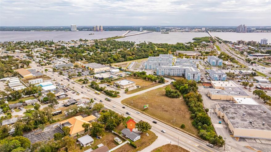 Check out 3D Matterport Tour on the link provided! Position your business or investment in the heart of North Fort Myers along highly traveled Pondella Road. This stand-alone commercial building is zoned CS-2 but it is located within the North Fort Myers Community Plan Area--Land Development Code (LDC) Section 33-1566 which establishes that any commercial zoned property with frontage on Pondella Road are subject to the North Fort Myers Commercial Corridor special regulations which has its own permitted schedule of uses. This opens up SO MANY OPPORTUNITIES!! The property is being sold partially (mostly) FURNISHED & is currently configured as a professional office which was remodeled in 2020 and features approximately 1,100± sq ft (just over 1,300 sq ft including carport) with multiple private offices, a conference room, reception area, kitchen, storage, two bathrooms, and ADA accessible. Its layout is well-suited for professional offices, medical or wellness practices, administrative services, and other service-oriented commercial uses. ROOF replaced in 2022. Situated on a high-visibility corner location with strong traffic counts and excellent signage exposure, this site provides convenient access for clients, staff, and patients while benefiting from the County’s long-term vision for corridor reinvestment and revitalization. Under CS-2 zoning combined with the North Fort Myers Commercial Corridor use schedule (LDC Sec. 33-1596), many office and service uses are permitted by right or administrative approval, making this an attractive opportunity for owner-users, medical professionals, and office investors seeking certainty and flexibility. Agents, please see confidential remarks for LDC uses!