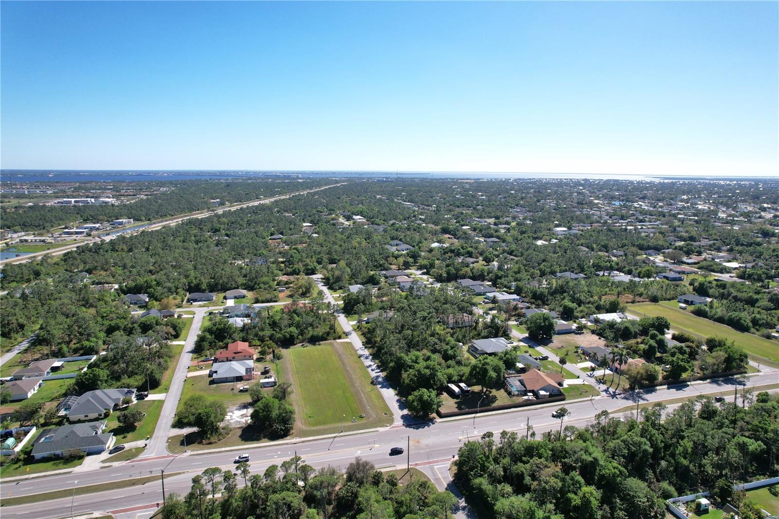 Great opportunity to buy and build or invest and wait. Location is close to Highway 41 or Tamiami Trail and Highway I-75. Lot size: 0.23 of acre = 10,000 sq ft. Great location to invest or build your new home. NO Flood zone (X). Public water and in ground utilities. Scrub jay free, no permit needed. Pick your own builder or ask for help. Conveniently located close to I-75 and local amenities, beaches, and Tiki Bars and Live entertainment daily. The best Tarpon and red game fishing in the world with off speed boat racing to spring training baseball teams as The Atlanta Braves and Tampa Rays baseball teams. Just want to go to the local beaches (Port Charlotte, Boca Grande, Englewood and Sarasota beaches) or fishing for the day. Great to do it all with whatever you can dream or do as a hobby. Local International Airports: Fort Myers, Sarasota and local Punta Gorda with Allegiant airlines direct. Many outdoor concert venues weekly. Many local Tiki Clubs watch live entertainment to have a Sunset view. Local parks, state parks, tennis or pickleball, to amazing golf courses.