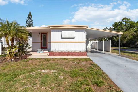 Photo of 5203 W Pine Street N, St Petersburg, FL 33709 (MLS # TB8490862)