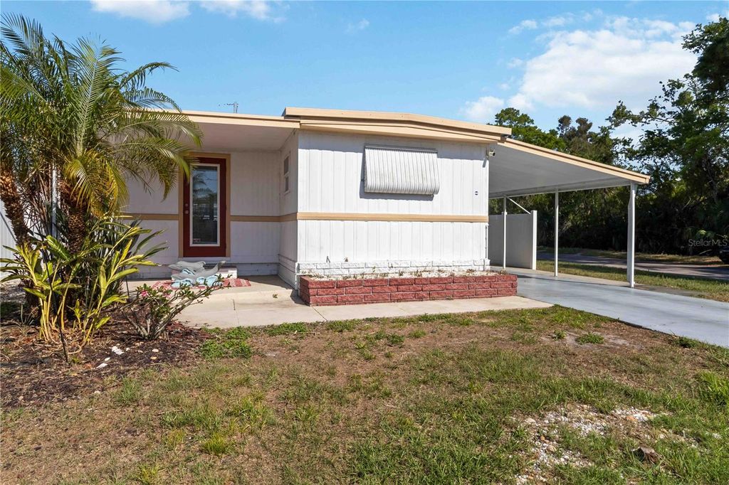 Photo of 5203 W Pine Street N, St Petersburg, FL 33709 (MLS # TB8490862)